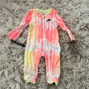 Nike baby zip up one-piece. New with tags. Size 3months.